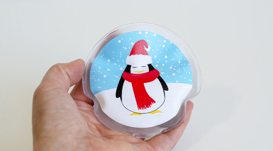 Božićni grejač za ruke sa slikom pingvina
